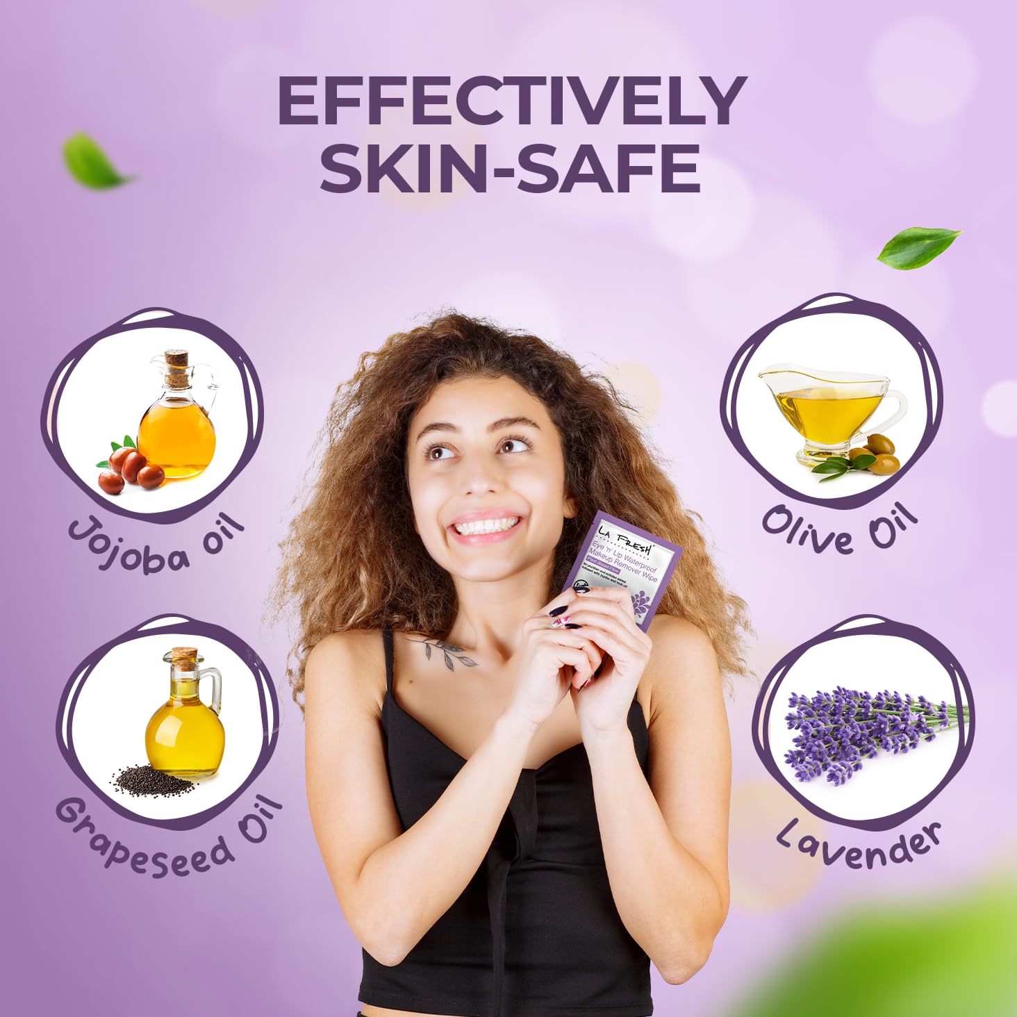 Woman holding a LA Fresh 24/7 Daily Makeup Remover Wipes with images of oils and lavender on a purple background